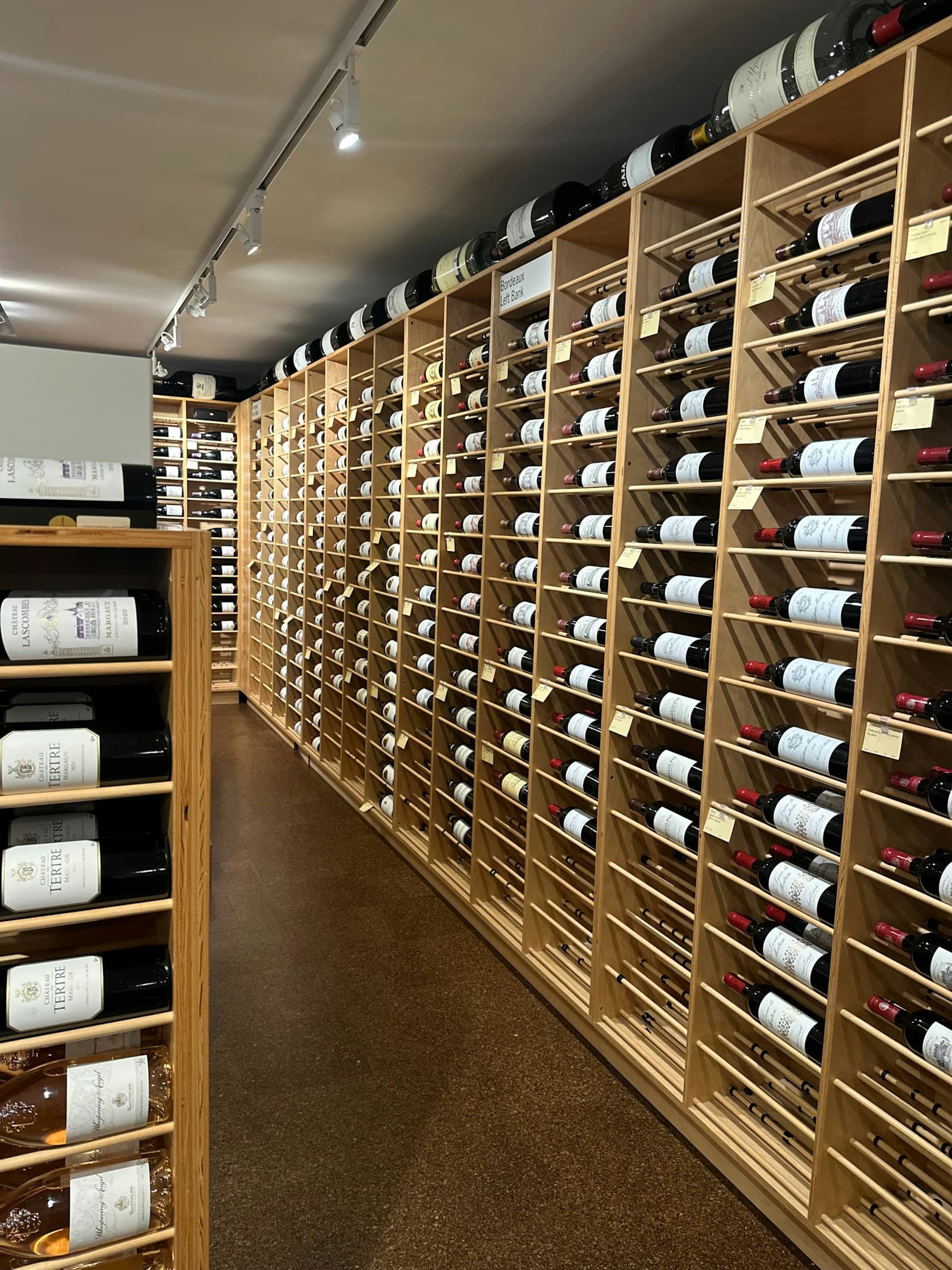 Bottles resting in a traditional wine cellar